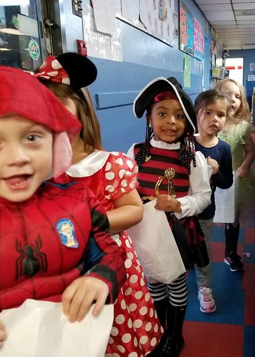 Children at Lil Red Hen Nursery Children and staff together at Lil Red Hen Nursery