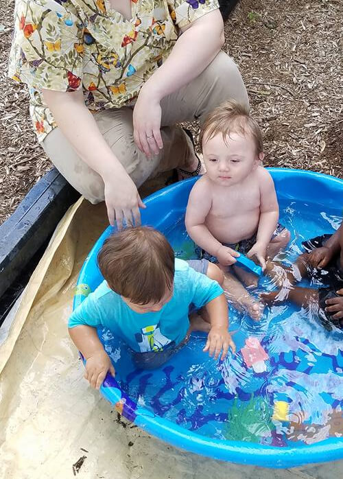 Children at Lil Red Hen Nursery Children and staff together at Lil Red Hen Nursery