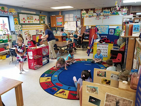 Children at Lil Red Hen Nursery Children and staff together at Lil Red Hen Nursery